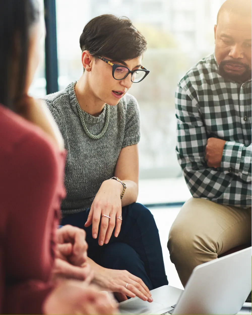 A team member leading a working discussion